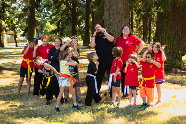 Our Kung Fu students making a silly pose at the Park Promo 2022