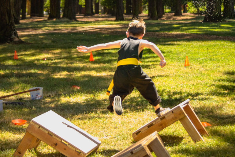 Students compete in our 2022 Kung Fu park obstacle course.