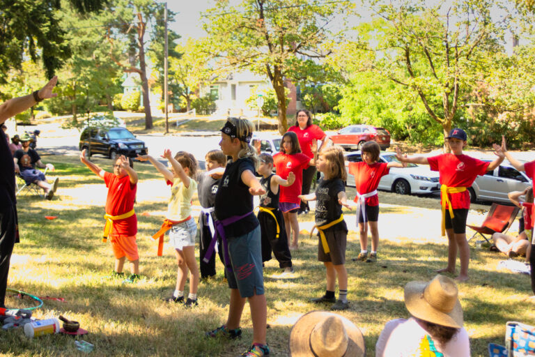 Our kung fu community during salutation during our park promotion 2022
