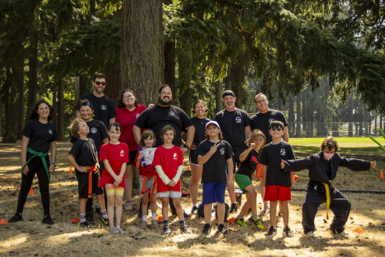 Our Kung Fu community smiling for a group photo 2023