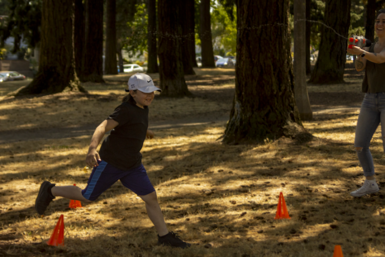 Students compete in our 2023 Kung Fu park obstacle course.