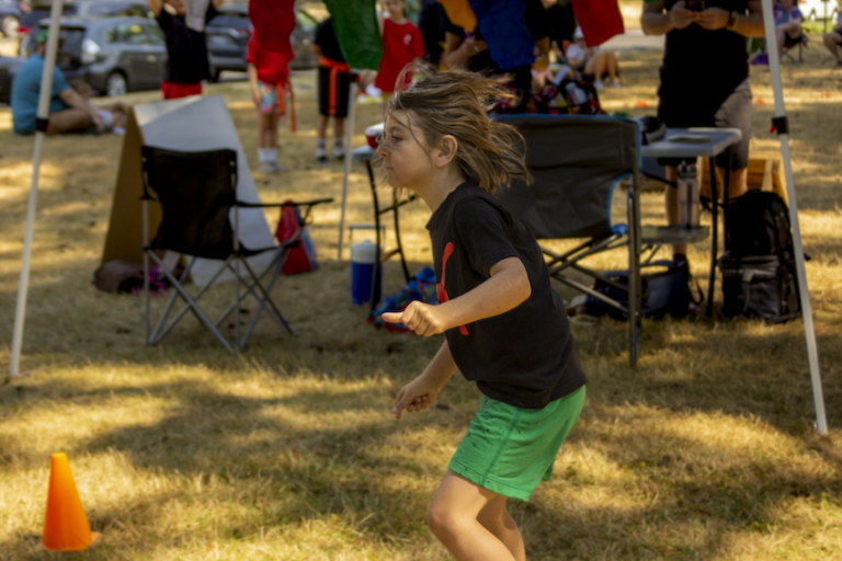 Students compete in our 2023 Kung Fu park obstacle course.