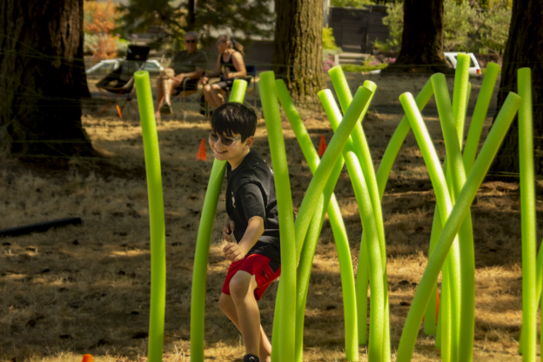 Students compete in our 2023 Kung Fu park obstacle course.