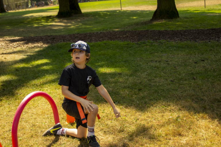 Students compete in our 2023 Kung Fu park obstacle course.