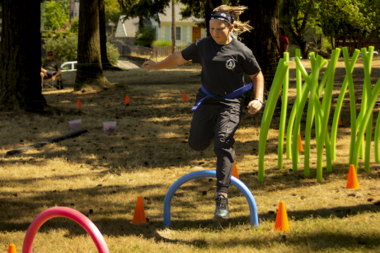 Students compete in our 2023 Kung Fu park obstacle course.