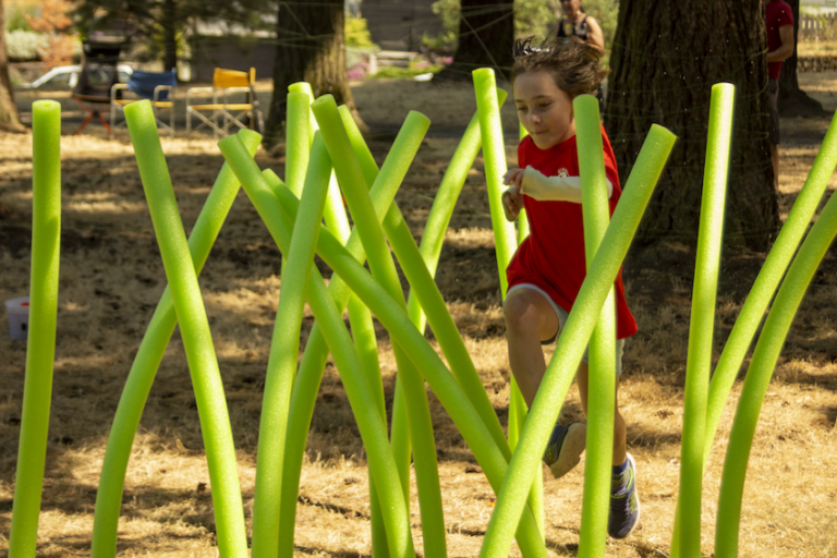 Students compete in our 2023 Kung Fu park obstacle course.