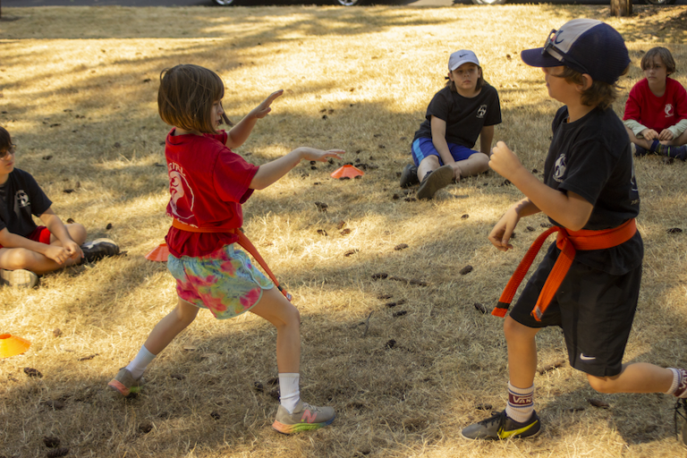 Students spar during our 2023 Kung Fu park promotion.