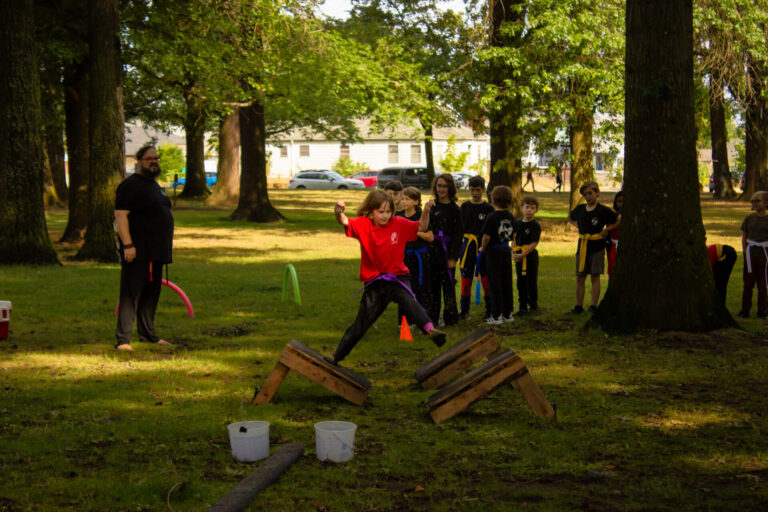 Kung fu students celebrate at our park demo 2024
